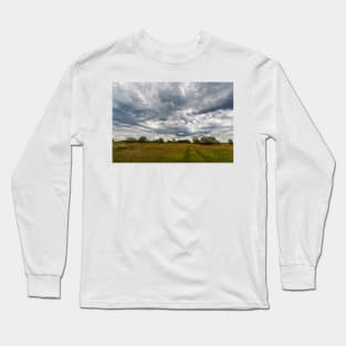 Stormy clouds over meadow Long Sleeve T-Shirt